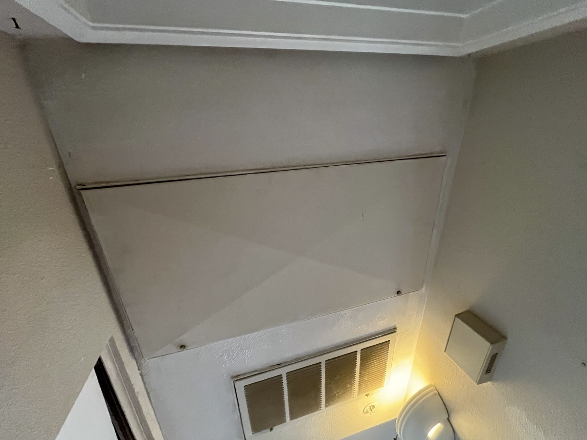 Patched and textured ceiling area before primer and paint